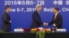 U.S. Secretary of State John Kerry shakes hands with Chinese Vice Premier Wang Yang during the US - China Strategic and Economic Dialogue at the Great Hall of the People in Beijing, June 7, 2016. 