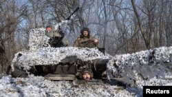 Украинские бойцы близ Бахмута. Февраль 2023 г. 