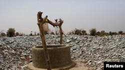 A well dug in the dry ground is seen near the village of Tata Bathily in Matam, Senegal on March 30, 2022. (REUTERS/Ngouda Dione)