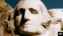 FILE - George Washington's face on Mount Rushmore.