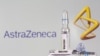 FILE - A test tube labeled "Vaccine" is seen in front of the AstraZeneca logo in this illustration photo taken Sept. 9, 2020. 
