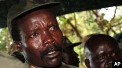 FILE - Joseph Kony, the leader of the Lord's Resistance Army, answers journalists' questions following a meeting with UN humanitarian chief Jan Egeland at Ri-Kwangba in southern Sudan, Nov. 12, 2006.