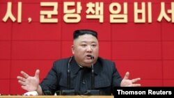 North Korea's leader, Kim Jong Un, speaks during the first short course for chief secretaries of the city and county party committees in Pyongyang, North Korea, in this undated photo released on March 5, 2021, by North Korea's Korean Central News Agency