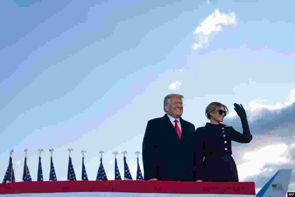 Outgoing President Donald Trump and first lady Melania Trump address guests at Joint Base Andrews in Maryland.
