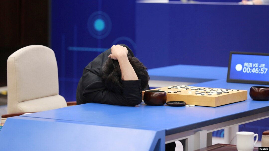 Chinese Go player Ke Jie reacts during his second match against Google's artificial intelligence program AlphaGo at the Future of Go Summit in Wuzhen, Zhejiang province, China, May 25, 2017.