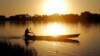 A fisherman rows a canoe on Lake Chad, in Koudouboul, Chad, Nov. 25, 2006. 