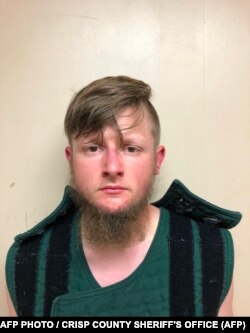 This handout booking photo released by the Crisp County Sheriff's Office on March 16, 2021 shows 21-year-old shooting suspect Robert Aaron Long.