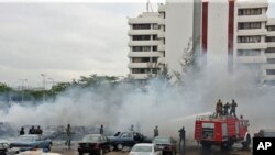 Scène d'un attentat revendiqué par Boko Haram à Abuja, le 16 juin, 2011