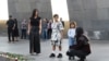 ARMENIA -- Reality TV personality Kim Kardashian and her sister Kourtney Kardashian with children visit Tsitsernakaberd Armenian Genocide Memorial in Yerevan, October 8, 2019