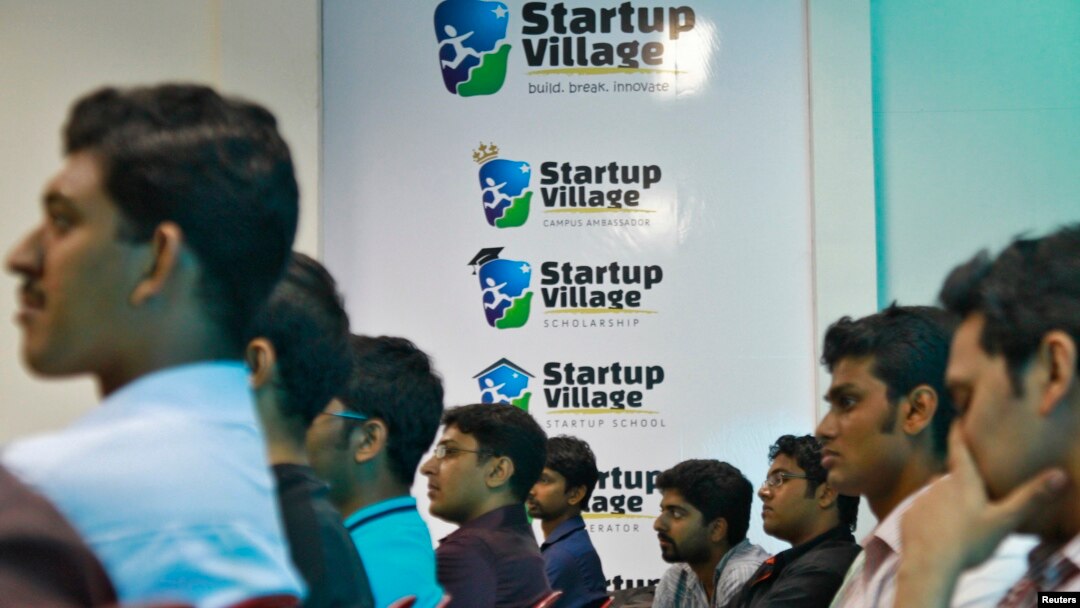 FILE - Entrepreneurs, employees and students listen to a speech during the Start-up saturday event at the Start-up Village in Kinfra High Tech Park in the southern Indian city of Kochi.