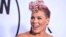 FILE - Pink arrives at the American Music Awards at the Microsoft Theater in Los Angeles, Nov. 19, 2017.