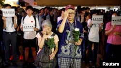 People attend a protest in Hong Kong, Aug. 30, 2019.