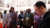 Delegates from Burkina Faso enter the main hall before the opening ceremony of the Forum on China-Africa Cooperation (FOCAC) in Beijing's Great Hall of the People, Sept. 5, 2024.