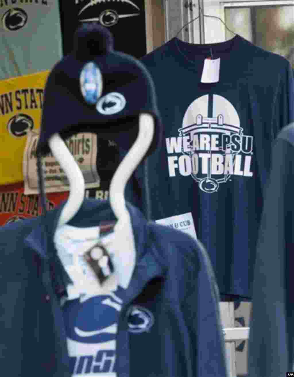 In this Nov. 18, 2011 photo, Penn State apparel displays for sale outside a sporting goods store off campus in State College, Pa. The unfolding Penn State child molestation scandal has slammed the university's reputation, and part of the immediate fallout