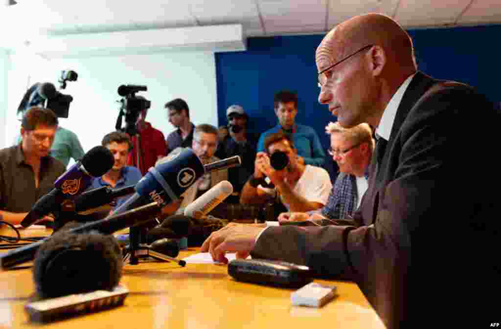 July 26: Geir Lippestad, lawyer of Norwegian Anders Behring Breivik, the man accused of a killing spree and bomb attack in Norway, delivers a statement and answers questions in Oslo. REUTERS/Wolfgang Rattay