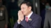FILE - Thai former Prime Minister Thaksin Shinawatra arrives at Don Muang airport in Bangkok, Thailand, on Aug. 22, 2023.