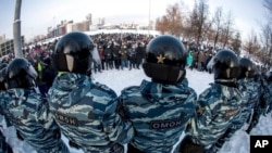 FILE - Police in Yekaterinburg, Russia, block a protest over the jailing of Alexei Navalny, Jan. 23, 2021.