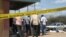 Kenyan security forces secure the African Inland Church after an attack in Kenya's northern town of Garissa, July 1, 2012. 
