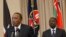 FILE - Kenya's President Uhuru Kenyatta (L) accompanied by Deputy President William Ruto, right, speaks to the media at State House in Nairobi, Kenya, Sept. 21, 2017.