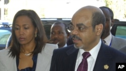Ethiopia Prime Minister Meles Zenawi with First Lady Azeb Mesfin arrive at the African Union summit being held in Addis Ababa, January 30, 2011. 
