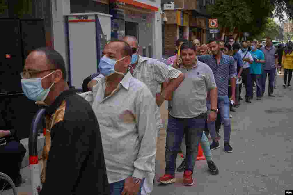 Before the vote, authorities assured voters that all safety precautions would be in place to prevent a resurgence of the coronavirus in Cairo, Aug. 11, 2020.