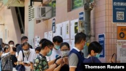 شهروندان هنگ کنگ برای انتخاب نامزدهای خود برای انتخابات سپتامبر شورای قانون‌گذاری صف کشیدند