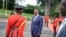 Ethiopia's new Prime Minister Abiy Ahmed, 42, who was installed in April, inspects the honor guard as he arrives to meet for bilateral talks with Uganda's President Yoweri Museveni at State House in Entebbe, Uganda, June 8, 2018. 