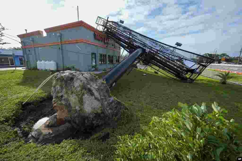 A billboard structure is seen after it was uprooted during Hurricane Milton, Oct. 10, 2024, in Clearwater, Florida.