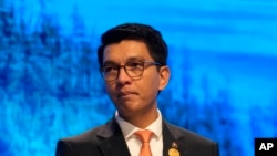 FILE - Andry Nirina Rajoelina, president of Madagascar, speaks at the COP27 U.N. Climate Summit, November 8, 2022, in Sharm el-Sheikh, Egypt. 