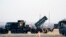 FILE: FILE - Patriot missiles are seen on March 25, 2022, in Jasionka, Poland, as President Joe Biden arrives to board Air Force One enroute to Warsaw. , The Biden administration has approved sending a Patriot missile battery to Ukraine