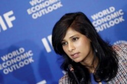 FILE - Gita Gopinath of the IMF speaks during a news conference in Santiago, Chile, July 23, 2019.