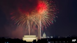 Fireworks explode over Lincoln Memorial, Washington Monument and U.S. Capitol building at the National Mall in Washington, Tuesday, July 4, 2017, during the Fourth of July celebration. (AP Photo/Jose Luis Magana)