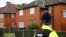 A policeman stands outside a residential property in south Manchester, Britain, May 24, 2017. 