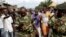 Protesters opposed to President Pierre Nkurunziza's decision to seek a third term in office shout at the army after a demonstrator was shot dead in the Kinama district of Bujumbura, Burundi, May 7, 2015.