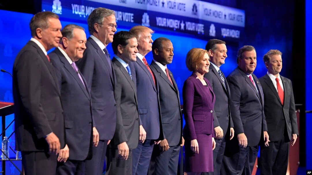 From left, John Kasich, Mike Huckabee, Jeb Bush, Marco Rubio, Donald Trump, Ben Carson, Carly Fiorina, Ted Cruz, Chris Christie and Rand Paul take the stage during the CNBC Republican presidential debate in Boulder, Colo., Oct. 28, 2015.