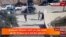 Кадр из видео, выпущенного в эфир иорданским телеканалом Al-Mamlaka, на котором виден момент нападения на церковь. 