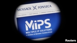 The website of the Mossack Fonseca law firm appears through a large format lens in Bad Honnef, Germany, April 4, 2016. 