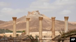 This photo released on Sunday March 27, 2016, by the Syrian official news agency SANA, shows a general view of Palmyra citadel, central Syria. 