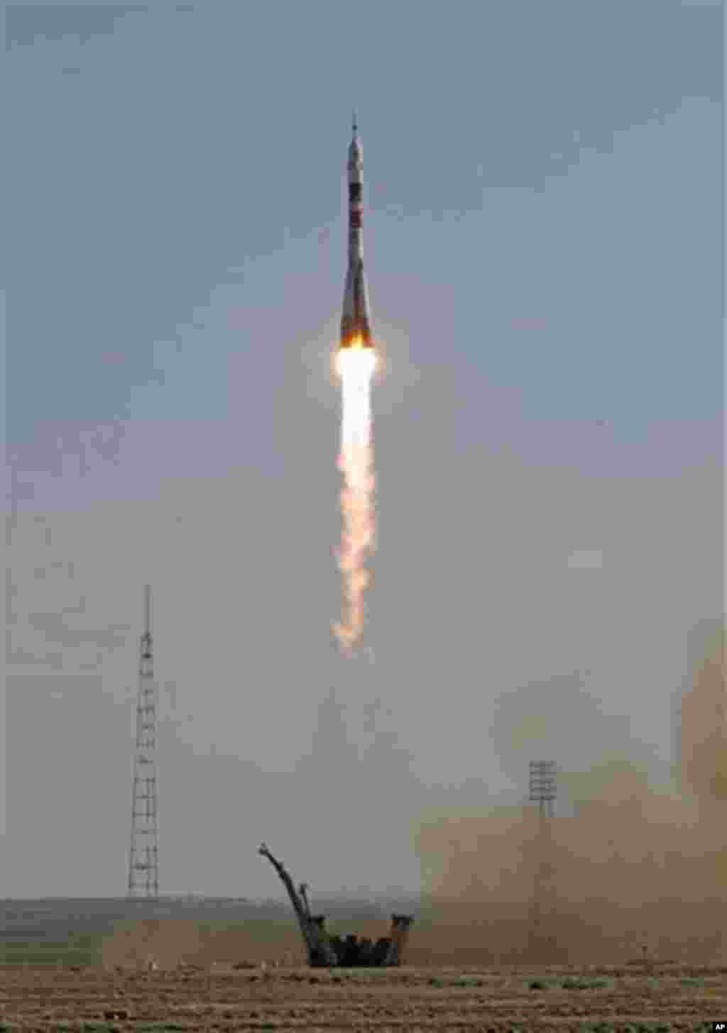 The Soyuz-FG rocket booster with a Soyuz TMA-04M spaceship carrying a new crew to the International Space Station, ISS, blasts off from the Russian leased Baikonur cosmodrome, in Kazakhstan, Tuesday, May 15, 2012. The Russian rocket is carrying U.S. astro