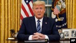 President Donald Trump speaks in an address to the nation from the Oval Office at the White House about the coronavirus Wednesday, March, 11, 2020, in Washington. (Doug Mills/The New York Times via AP, Pool)