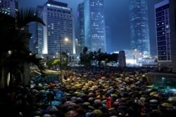 Civil servants attend a rally to support the anti-extradition bill protest in Hong Kong, Aug. 2, 2019.