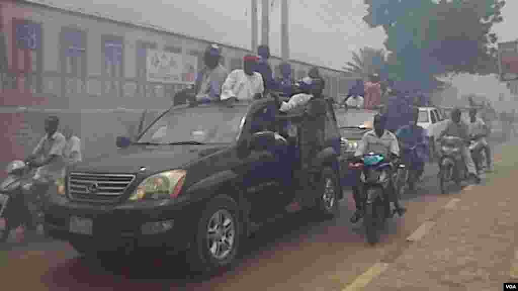 Carravan of vehicles escorting Manjo Hamza Al-Mustapha as he arrives in Kano.