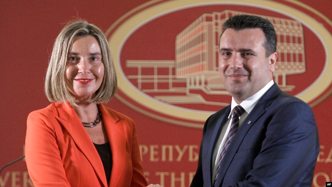 European Union High Representative for Foreign Affairs and Security Policy Federica Mogherini, left, and Macedonian Prime Minister Zoran Zaev pose for a photo, following their meeting at the government building in Skopje, Macedonia, April 18, 2018. 