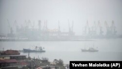 UKRAINE -- A trade port is seen through heavy rain in Berdyansk, south coast of Azov sea, eastern Ukraine, November 27, 2018