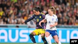 FILE - Colombia's forward #09 Mayra Ramirez and England's midfielder #04 Keira Walsh fight for the ball during the Australia and New Zealand 2023 Women's World Cup quarter-final match Sydney on August 12, 2023.