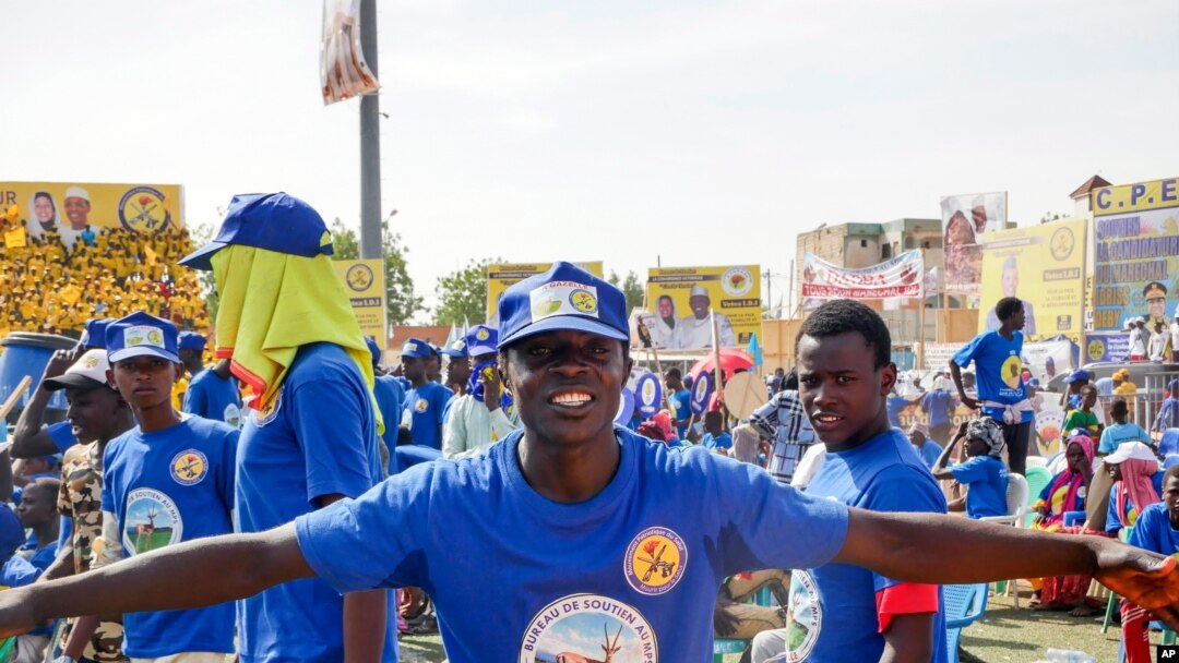 Supporters of Chadian President Idriss Deby Itno gather for a rally in N'djamena, Chad, Friday April 9, 2021. Deby is seeking to extend his three-decade long rule, running for a sixth time in this oil-producing Central African nation.