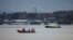 In this photo provided by the British Ministry of Defense on Feb. 23, 2024, the Royal Navy Bomb Disposal Team leaves the slip to Torpoint Ferry preparing to dispose of a WWII bomb discovered in Plymouth.