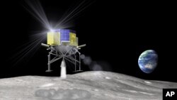 In this artist rendering released by the Japan Aerospace Exploration Agency, or JAXA, April 20, 2015, the space explorer named SLIM (Smart Lander for Investigating Moon) lands on the moon.