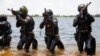 FILE - Ghanaian soldiers conduct combat drills during Flintlock 2023 at Sogakope beach resort, Ghana, March 14, 2023. Soldiers from several African countries were trained in counter-insurgency tactics as part of this annual U.S.-led exercise. 