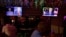The dual town halls of U.S. Democratic presidential candidate Joe Biden and U.S. President Donald Trump, who are both running in the 2020 U.S. presidential election, are seen on television monitors at Luv Child restaurant ahead of the election in Tampa, Florida.